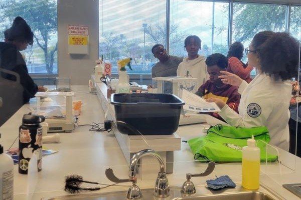 Students learn about pharmacy compounding in the lab.