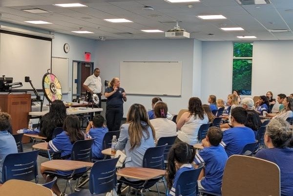 Kids learn about safety from Downers Grove police. 