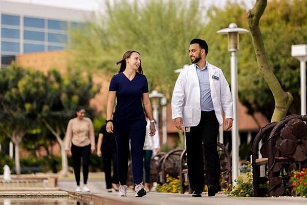 MWU Students Walking outside Glendale campus toward the right