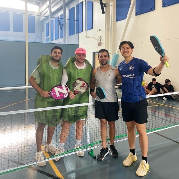 Pickleball tournament winners gather for a photo.