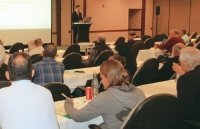 Clinical Refresher Course attendees listen to presenter.