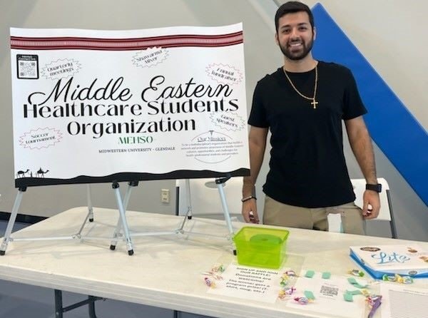 AZ Middle Eastern Healthcare Student Organization table at the fair.