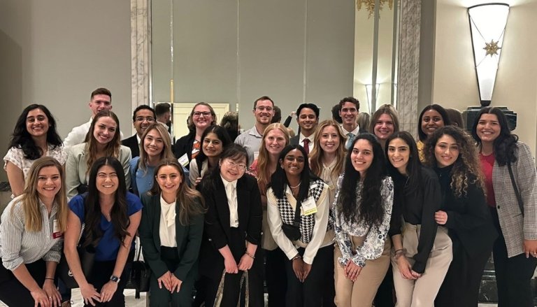 CCOM stand inside Capitol Hill.