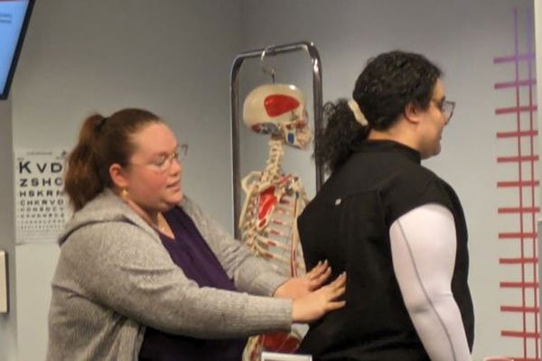 Osteopathic Manipulative Medicine Scholars demonstrate OMM techniques.