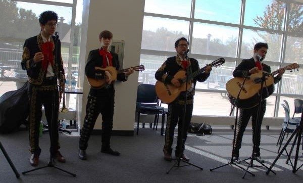 The mariachi band serenades attendees in the Commons.