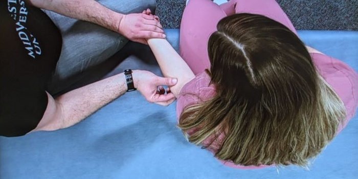 Cameron Braz and Jordan Barry show OMM upper extremity movements.