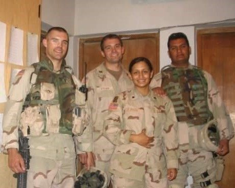 Mohamad Abdul-Mabood in a group of Army soldiers, and all are in uniform.