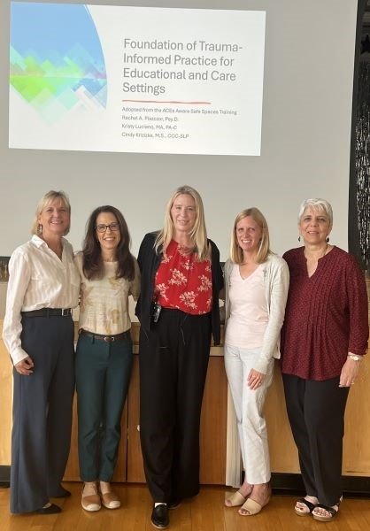 College of Health Sciences faculty gather for a photo at the community service event.