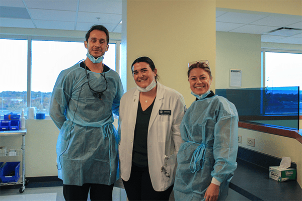 Dental student Noah Hart (CDMI ’26), physical therapy student Leah Sindberg (CHS-Downers Grove PT ’25), and dental student Brianna Brown (CDMI ’26). 