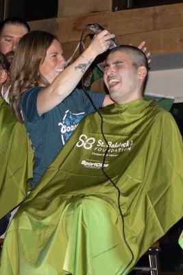 One student gets head shaved.
