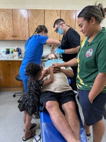 Tonga patient receives dental care from CDMA students
