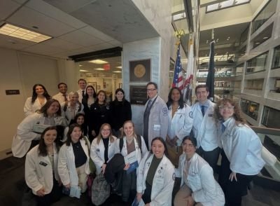 CCOM students outside office