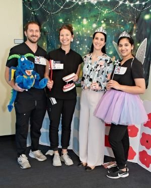 Dental students dressed in kid friendly costumes