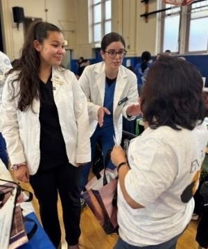 CDMI Students Ineract with  Attendees at Health Fair