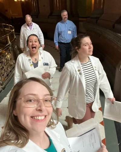 Students and doctors walking after meeting