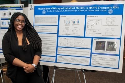 Bessem Ashu (CGS-Downers Grove MABS ’25) presents her research poster