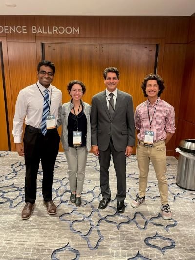 Arjun with fellow medical students and Dr. Bobby Mukkamala