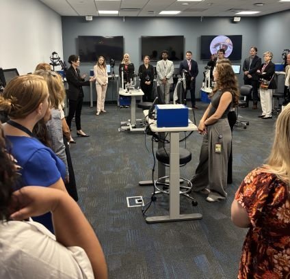 Dean talks to group in VR Magic Lab