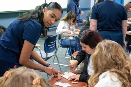 Midwestern student demonstrates technique