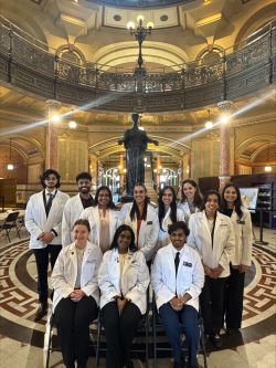 CCOM students sit in IL capitol