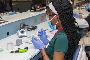 CPASS student works in dental lab
